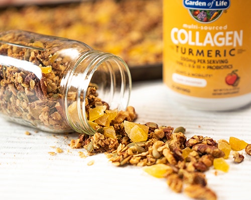 Turmeric Collagen Mango Granola spilling out of jar