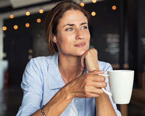 woman with coffee cup