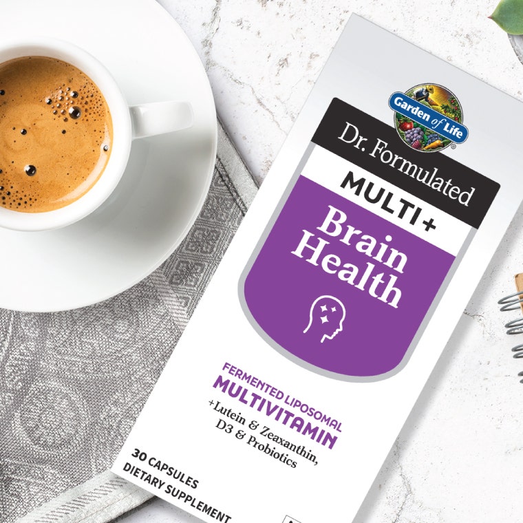 Dr. Formulated Multi Plus Brain Health next to an espresso