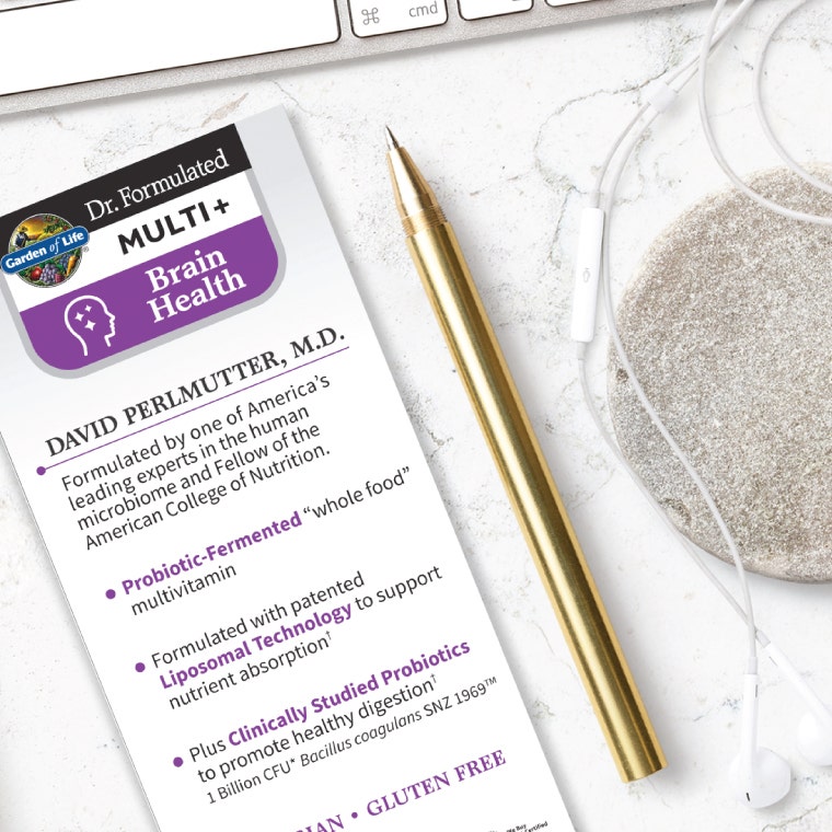 Dr. Formulated Multi Plus Brain Health next to gold pen