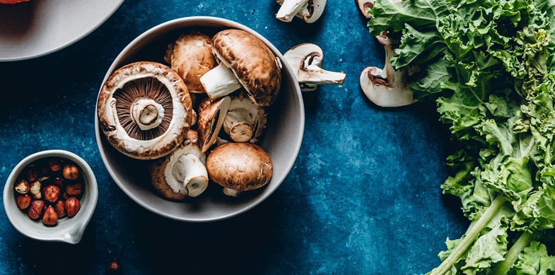 mushrooms and nuts in a bowl Zinc Benefits