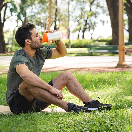 man drinking protein shake