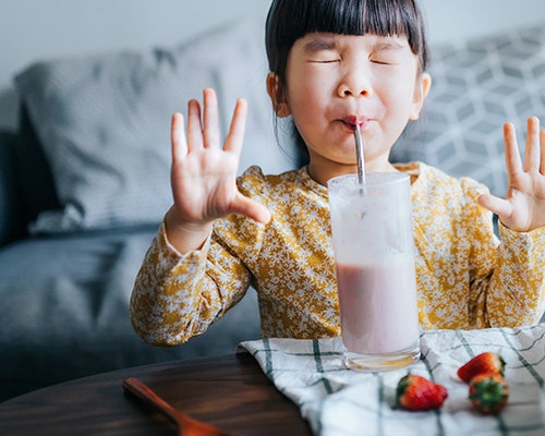 Child drinking on a smoothie